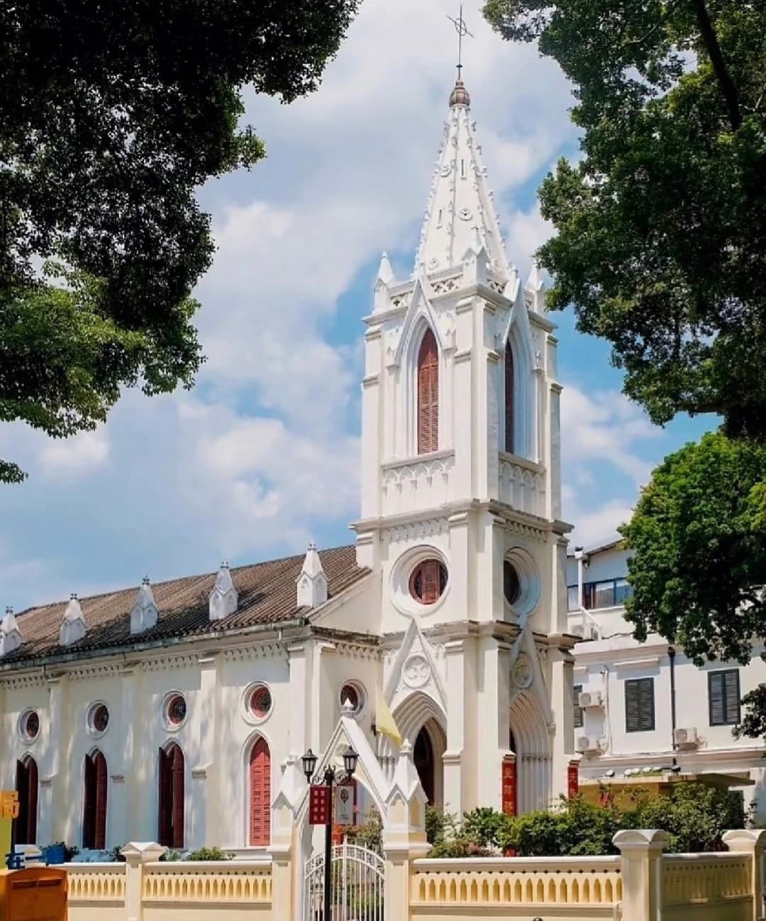 Beautifully preserved European-style building on a tree-lined street on Shamian Island